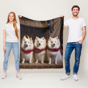 American Eskimo by the Fireplace Christmas Fleece Blanket