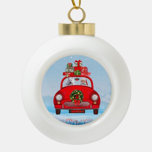 American Eskimo Dog In Car With Santa Claus Ceramic Ball Christmas Ornament