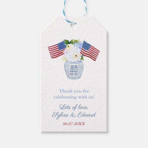 American Flag In Floral Ginger Jar Vase Wedding Gift Tags - Blue and white ginger jar vase filled with blue white and green flowers and topped off with two USA flags. The design also features a "Greek Key" pattern backer. On the reverse, you can change the contrast color (shown here as a dark blue) to any color you like by entering the design tool (underneath the text customization area, click to "customize further") then changing the background color on the reverse.
