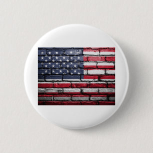 American flag painting on a brick wall button