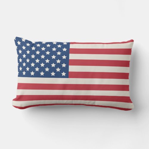 American Flag Red White and Blue Patriotic Lumbar Pillow - Patriotic home accent lumbar pillow features an American flag with stars and stripes in navy blue, red, and soft white colors.