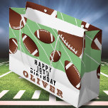 American Football Balls Fun Kids Birthday Large Gift Bag<br><div class="desc">American Football Balls Fun Kids Birthday Large Gift Bag. Footballl balls in different sizes and green background with stripes. Personalize the gift bag with your name and make a great birthday bag for a football fan.</div>