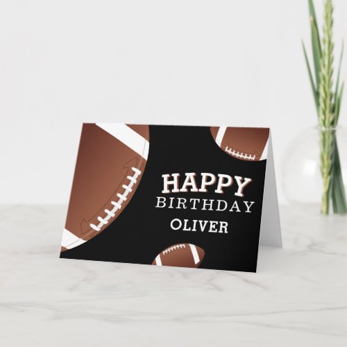 American Football Balls Sports Happy Birthday Kids Card - American Football Balls Sports Happy Birthday Card with Name. Football balls with a Happy birthday wish on a black background. Personalize with your name and make a special personal card for a boy or a girl who loves football.