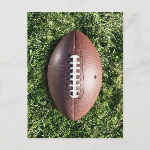 American football on grass postcard
