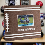 American Football Sport Fan Photo Scrapbook 3 Ring Binder<br><div class="desc">Enjoy this really customizable American football themed scrapbook album! Personalize with a photo and name on front, and jersey number on back. Brown photo leather background with double white stripes across top and bottom, and laced spine. PLEASE NOTE! - Use a HORIZONTAL photo on THIS album. And, I also have...</div>