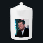 American President John F. Kennedy in Oval Office Teapot<br><div class="desc">The Oval Office became John F. Kennedy's command center during his tumultuous presidency. Stepping away from the grandiosity of previous presidents, JFK preferred a more intimate setting for meetings and decision-making. The iconic image of him rocking in his rocking chair, gifted by a rocking chair manufacturer during his campaign, became...</div>