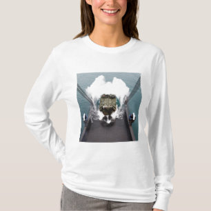 Amphibious assault vehicles disembark from USNS T-Shirt