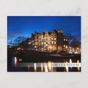 Amsterdam canal houses at night postcard