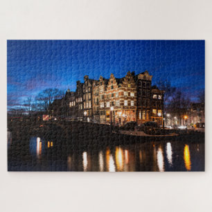 Amsterdam city canal houses at night jigsaw puzzle