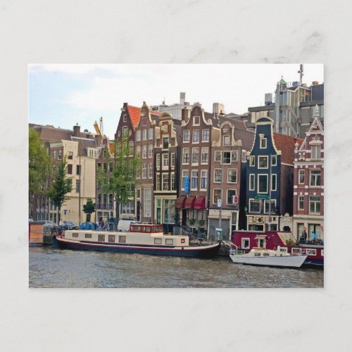 Amsterdam houses by the canal postcard