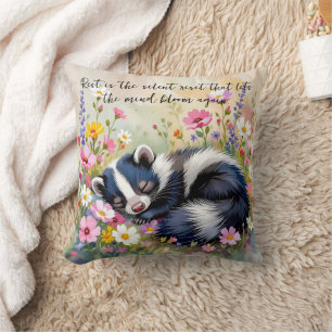 An Adorable Skunk Napping in Flowers and Quote Throw Pillow