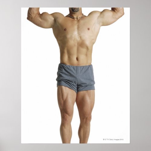 an adult caucasian male bodybuilder holds his poster