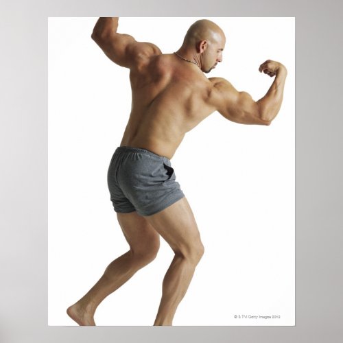 an adult caucasian male bodybuilder shows off poster