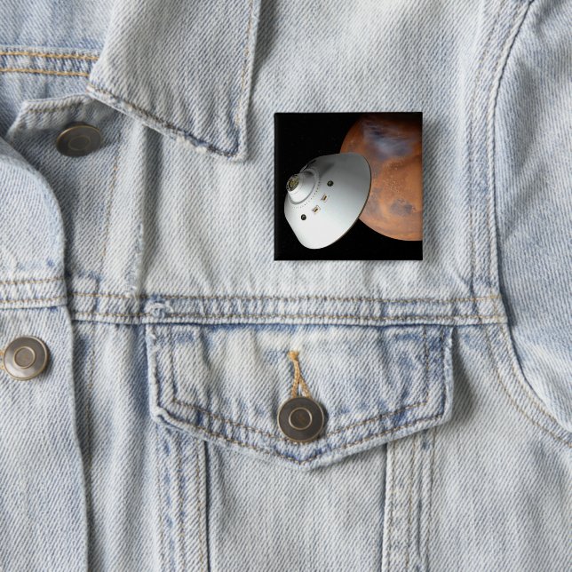 An Aeroshell-Encased Spacecraft Approaching Mars. Button (In Situ)