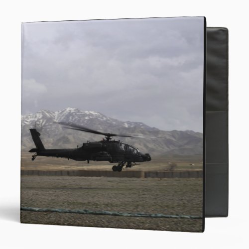 An AH_64A Apache taking off Binder