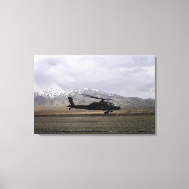 An AH-64A Apache taking off Canvas Print (Front)