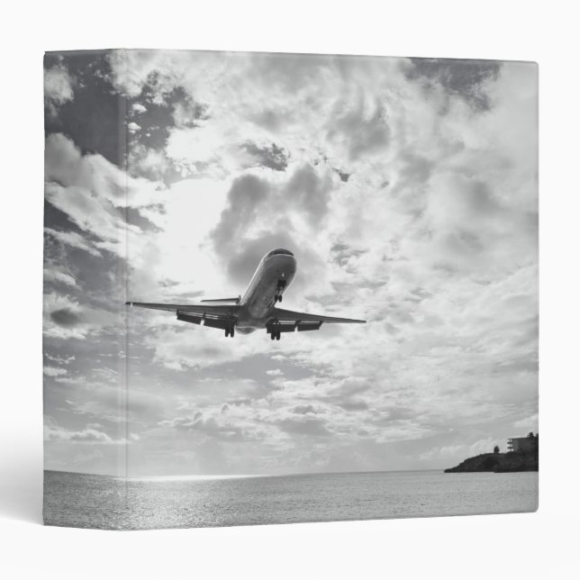 An airliner comes in for a landing at Princess Binder (Front/Spine)