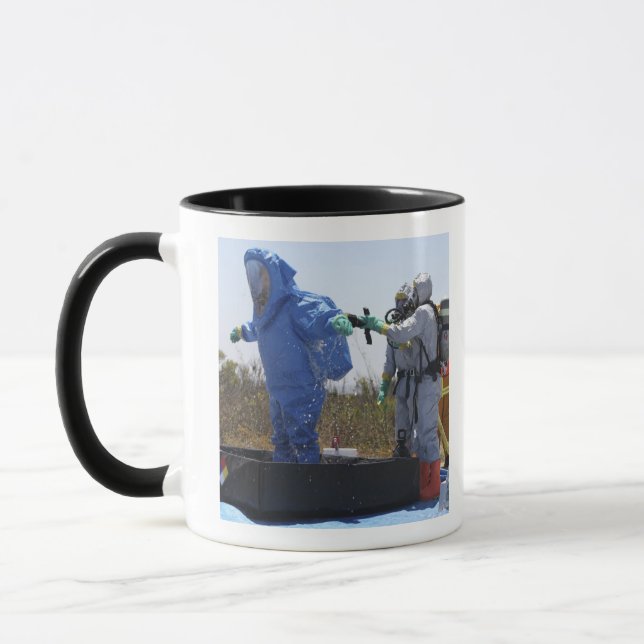 An airman stands in a tub mug (Left)