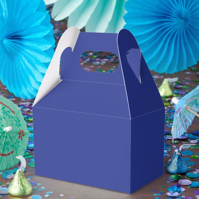 an airplane flying in the sky favor boxes (Party)