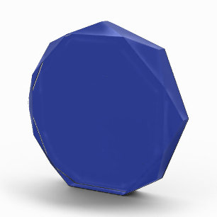 an airplane flying in the sky with a blue backgrou acrylic award