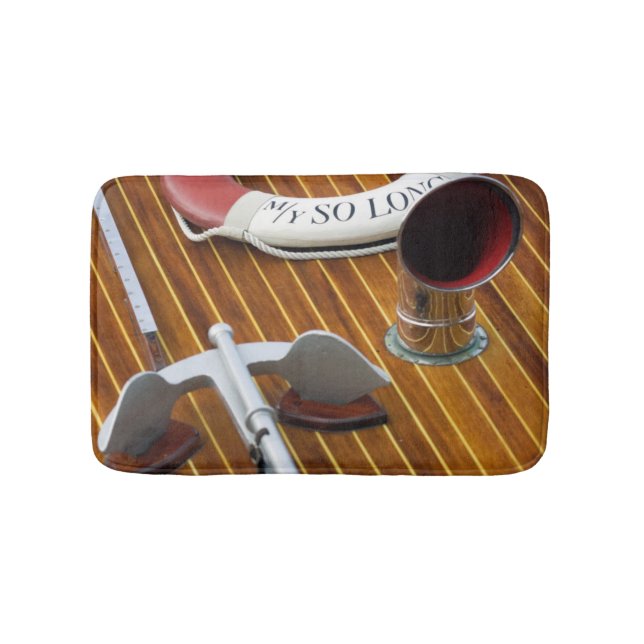An Anchor And A Life-Buoy On A Wooden Boat Bathroom Mat (Front)