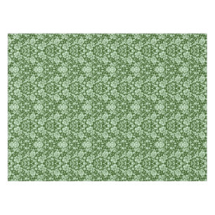 An antique floral damask tablecloth