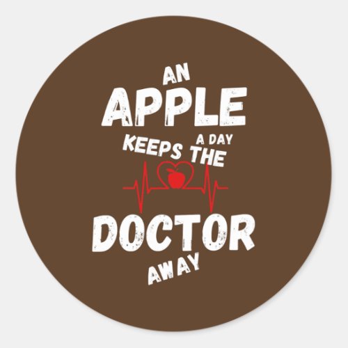 An apple a day keeps the doctor away saying classic round sticker