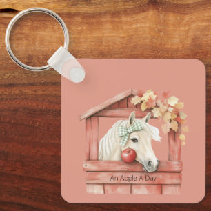 An Apple A Day White Horse Keychain