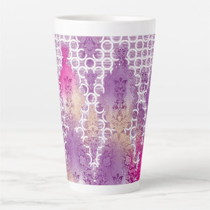 An artistic pattern displaying shades of purple an latte mug