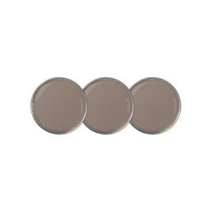 An artistic portrayal of brown color, showcasing i golf ball marker