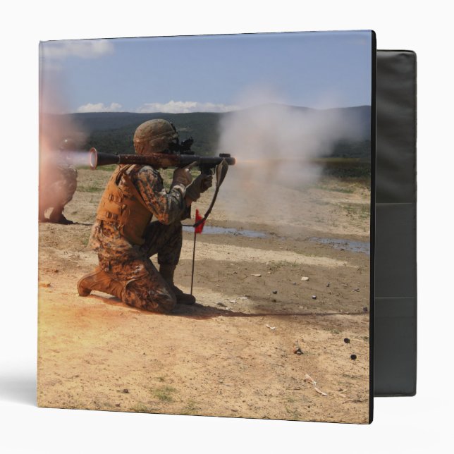 An assaultman fires a Rocket Propelled Grenade 3 Ring Binder (Front/Inside)