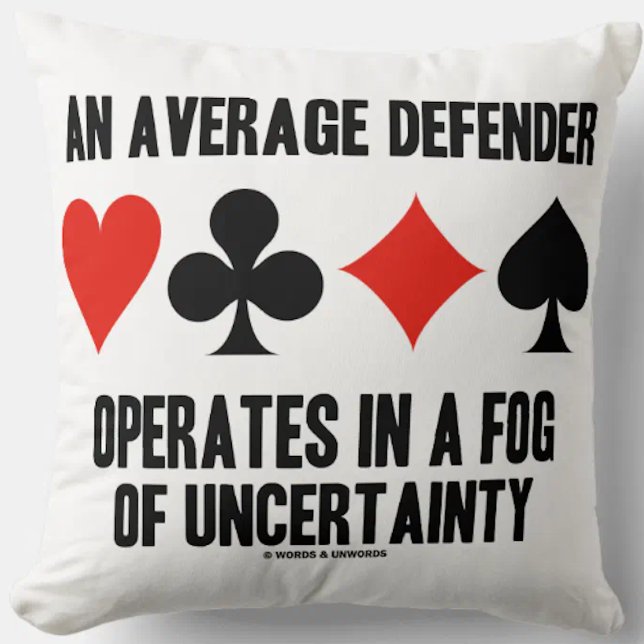 An Average Defender Operates In Fog Of Uncertainty Throw Pillow (Funny bridge saying throw pillow featuring four card suits along with often heard bridge truism)
