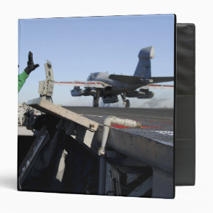 An EA-6B Prowler launches from the flight deck Binder