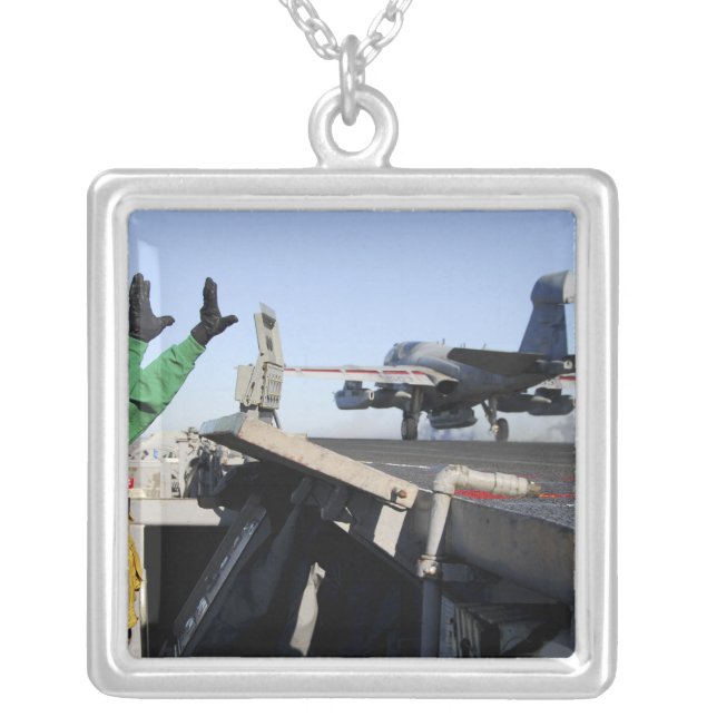 An EA-6B Prowler launches from the flight deck Silver Plated Necklace (Front)
