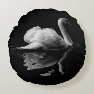 An Elegant White Swan On A Black Background Round Pillow
