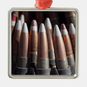 An even mix of four ball rounds to one tracer metal ornament