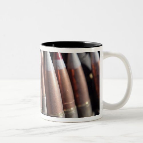 An even mix of four ball rounds to one tracer Two_Tone coffee mug
