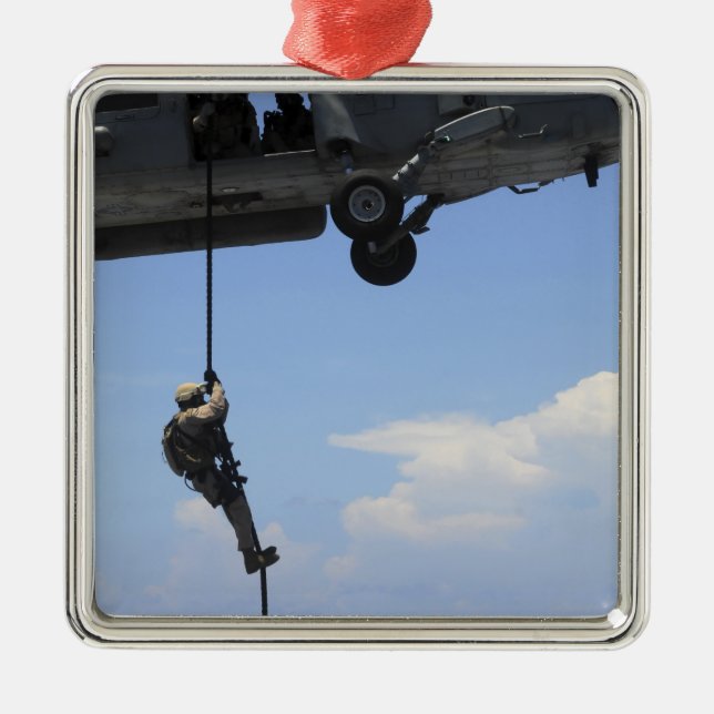 An explosive ordinance disposal technician metal ornament (Front)
