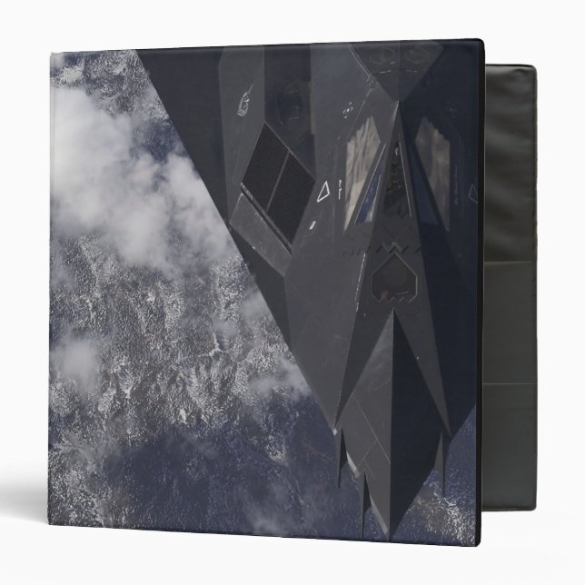 An F-117A Nighthawk flies high over the mountai 3 Ring Binder (Front/Inside)