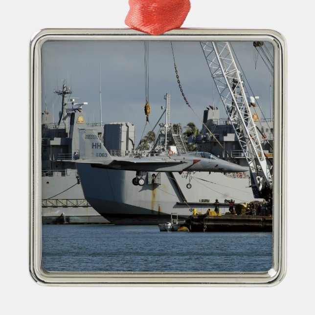 An F-15 Eagle gets a lift from a barge crane Metal Ornament (Front)