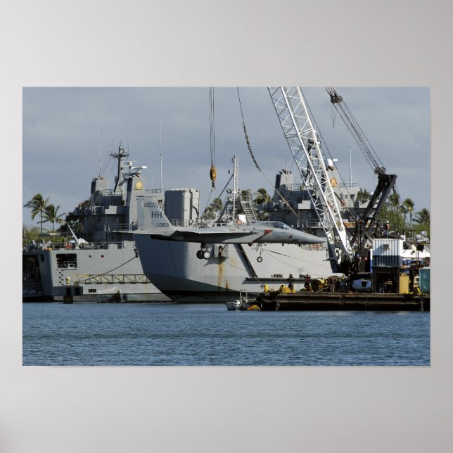 An F-15 Eagle gets a lift from a barge crane Poster (Front)