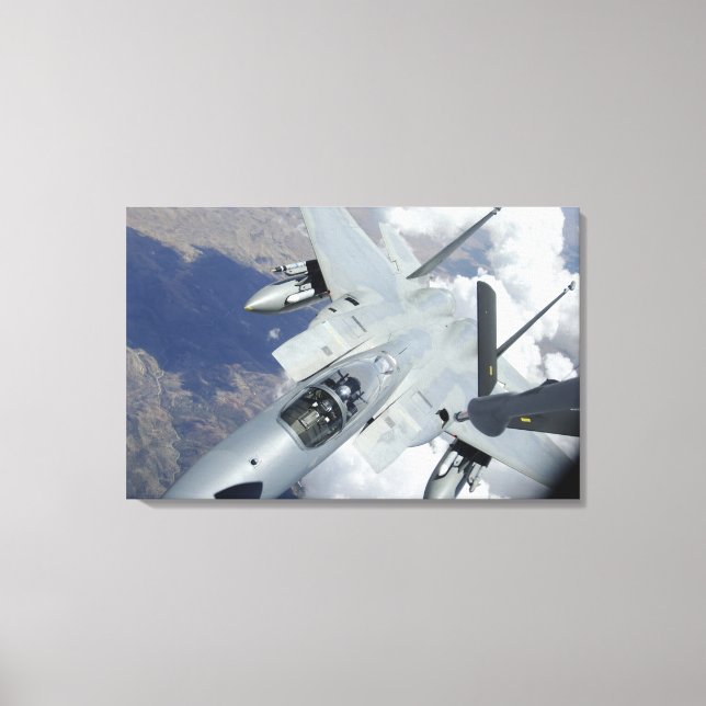 An F-15 Eagle pulls away from a KC-135 Canvas Print (Front)