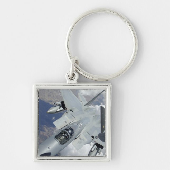 An F-15 Eagle pulls away from a KC-135 Keychain (Front)