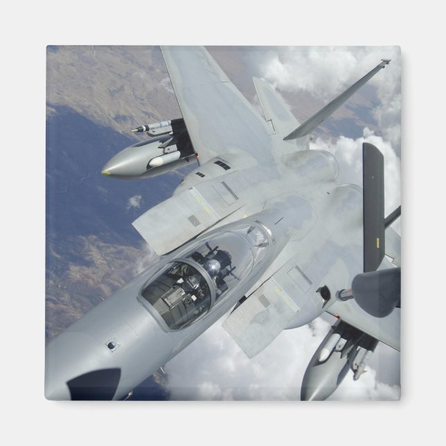 An F-15 Eagle pulls away from a KC-135 Magnet (Front)