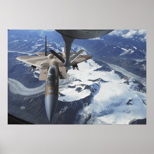 An F_15C Eagle aircraft sits behind a KC_135R Poster