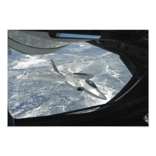 An F_22 Raptor banks away from a KC_135 Photo Print