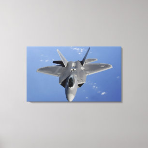 An F-22 Raptor moves into position to receive f Canvas Print