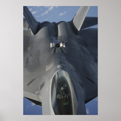 An F_22 Raptor moves into position to receive f Poster