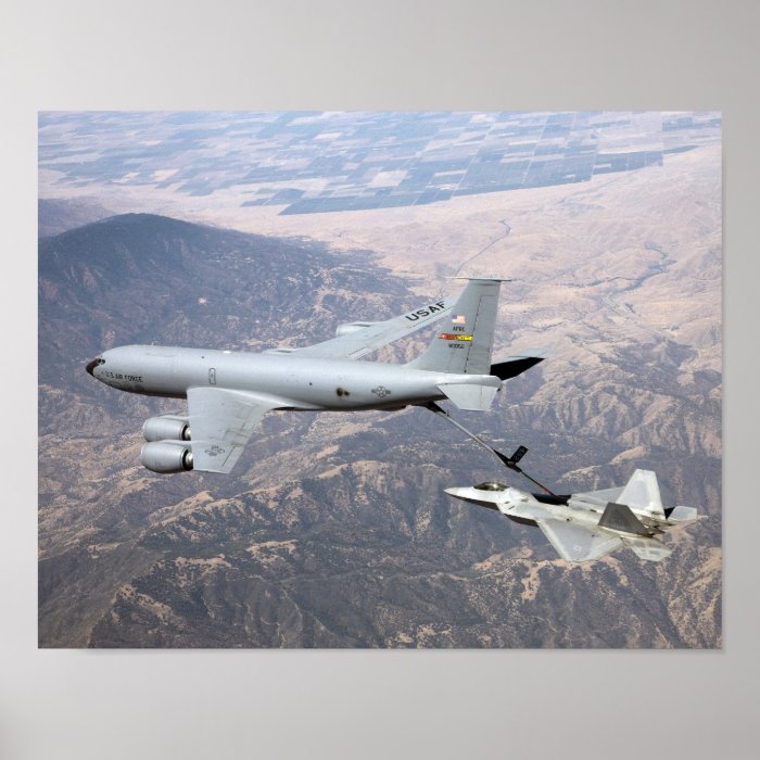 An F 22 Raptor receives fuel a KC 135 Poster