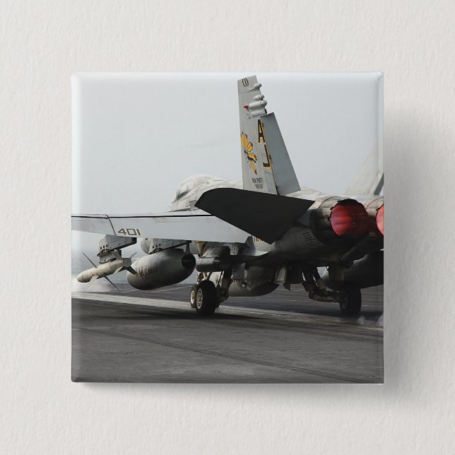 An F/A-18C Hornet launches from the flight deck 2 Button (Front)